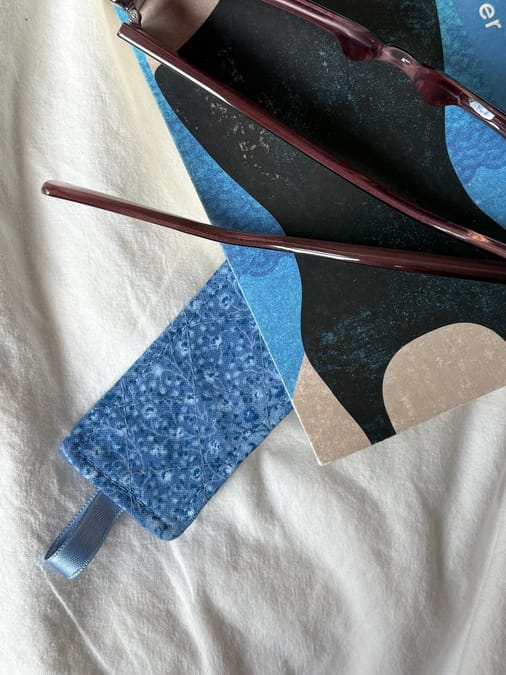 Handmade quilted fabric bookmark with ribbon