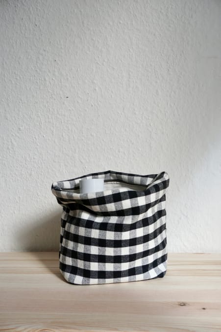 Handmade travel skincare and makeup bag in checkered IKEA canvas fabric