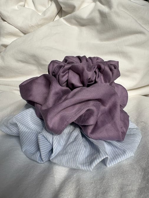 Stack of handmade scrunchies piled on top of each other