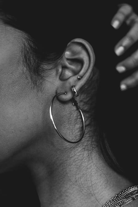 Different silver earrings/hoops in bw
